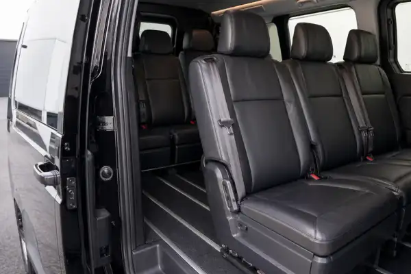 Family maxi taxi interior with child seat and passenger space